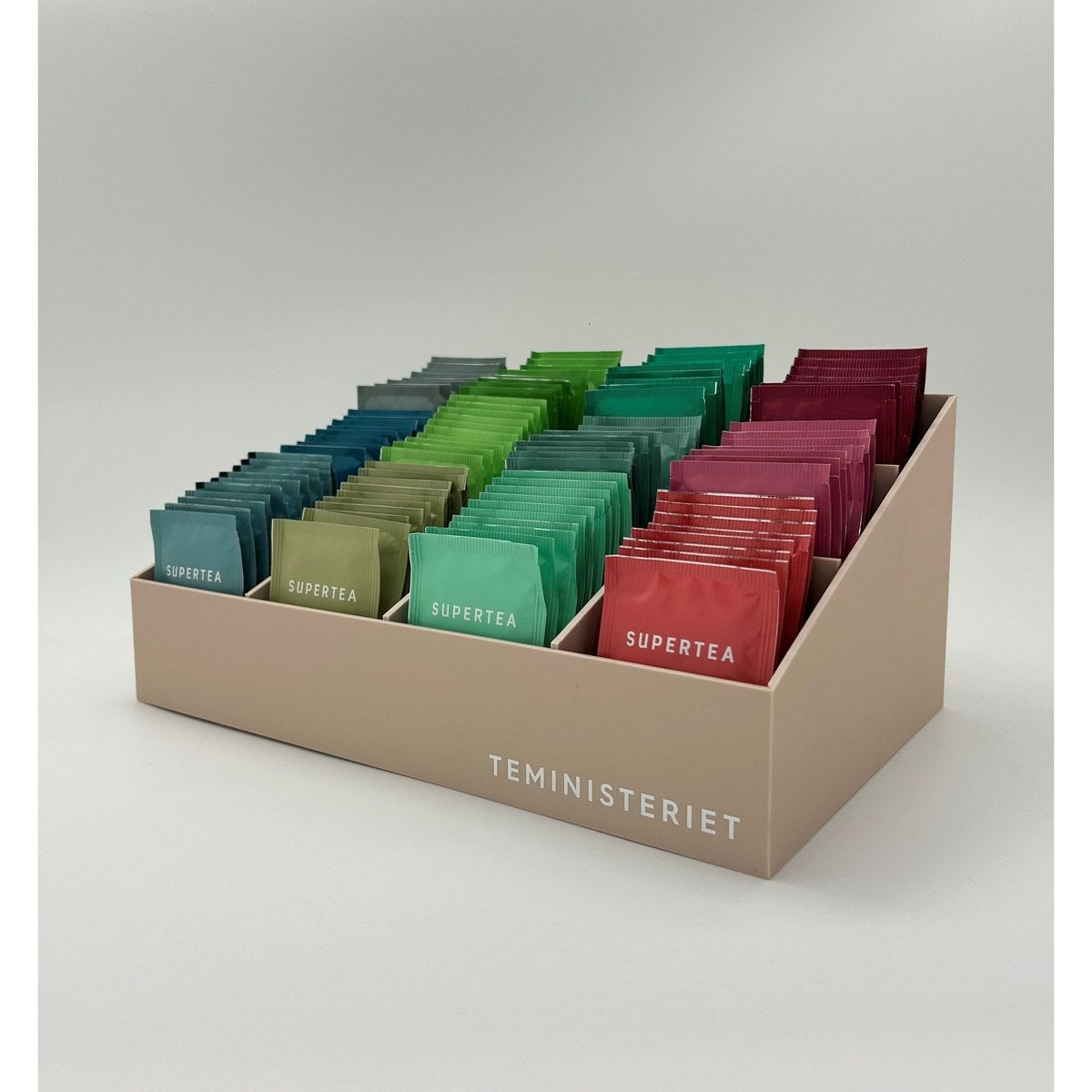 Supertea display med tebreve, minimalistisk beige design fra Teministeriet, sidevisning